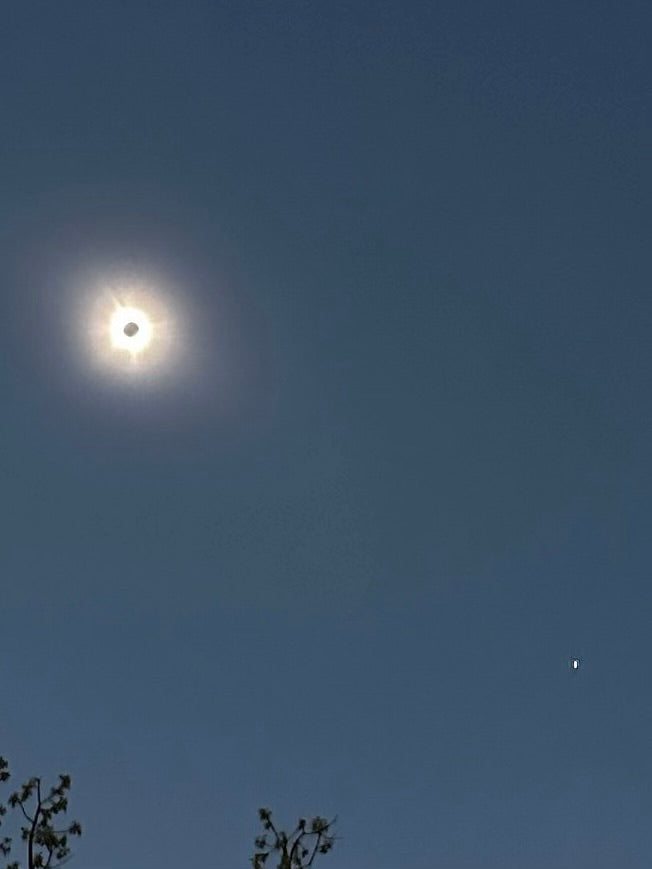 Clear blue sky capturing the pure solar frequencies present during the eclipse, infused into the TOTALITY Arkansas Quartz gem essence.