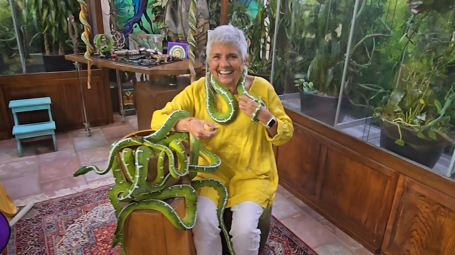 Star holding serpents while presenting Sacred Mysteries of the Serpent essence for deep spiritual wellness and energy alignment